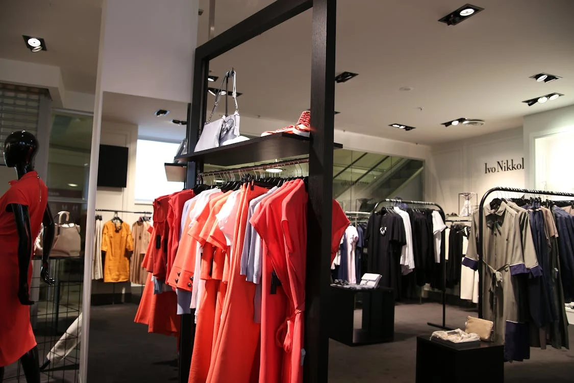 An image of Duster Cardigans Department Store displaying ladies wardrobe